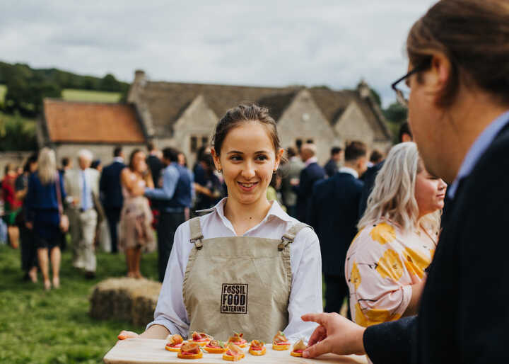 Fossil Food team serving wedding canapes